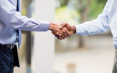 Close-up of business executives shaking hands